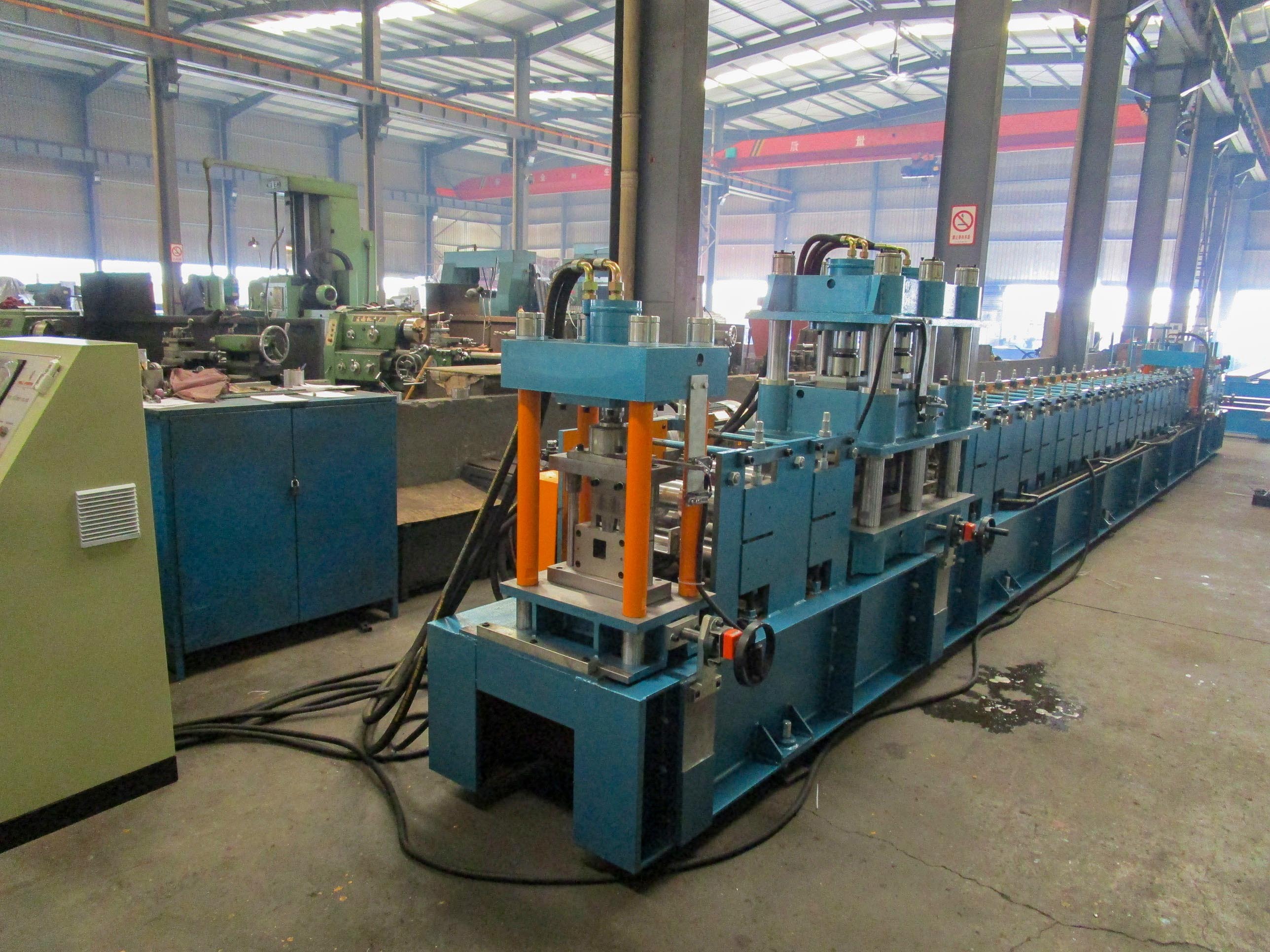 Drain Channel Roll Forming Machine - No.45 Steel, 11.5x1.1x1.7 M, Blue, 5.5 Kw Hydraulic Power, Automatic Length Cutting & Punching, Capacity 20 M/min, 24 Month Warranty