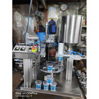 ऑटोमैटिक कप लोड फिलिंग फॉइल प्लेस सीलिंग मशीन