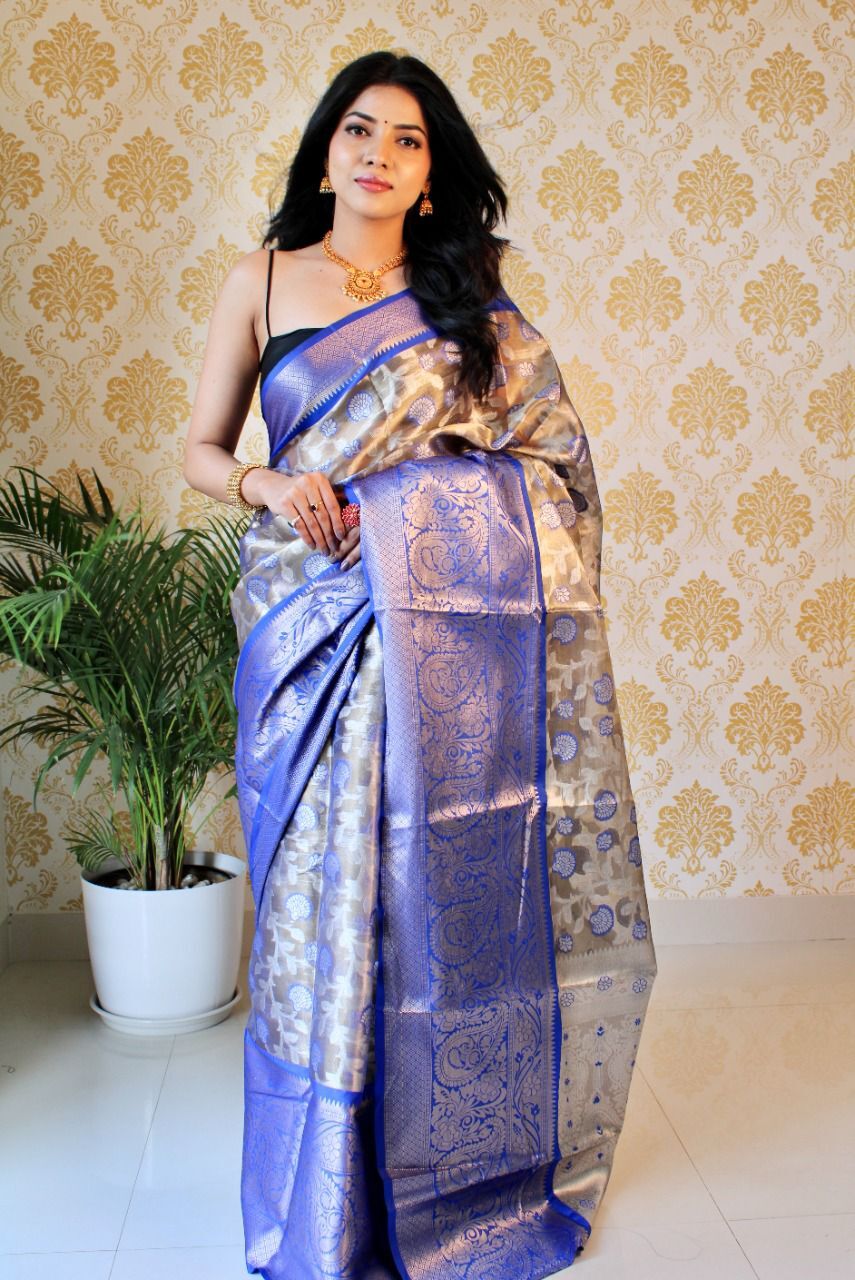 Jimisaree - Banarasi Tissue Silk With Woven Embossed Design, 5.50 Mtr Length, Beige Color With Fancy Brocket Blouse