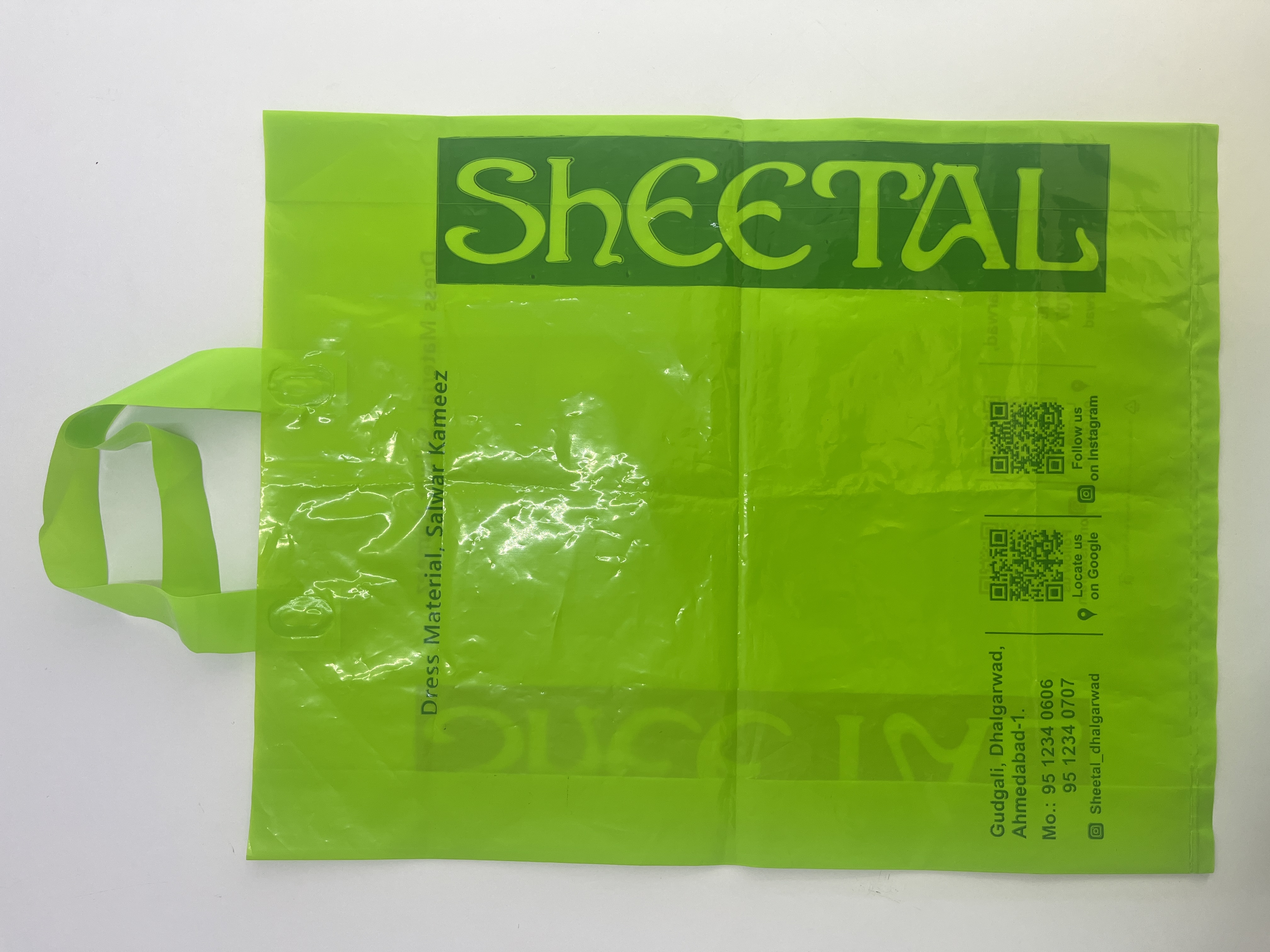 Flexographic Printed Plastic Bag - 10 X 14 Inches, 2 Mil Thickness, Green Color, Die-cut Handles, Pack Of 1000