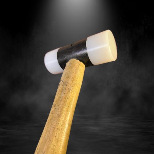 White Plastic Hammer With Wooden Handle