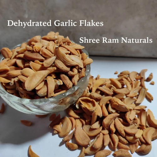 A Grade Dehydrated Garlic Flakes - 25 Kg Poly Bag, Golden Brown Color, Strong Aroma, Granular Shape, Shelf Life 24 Months