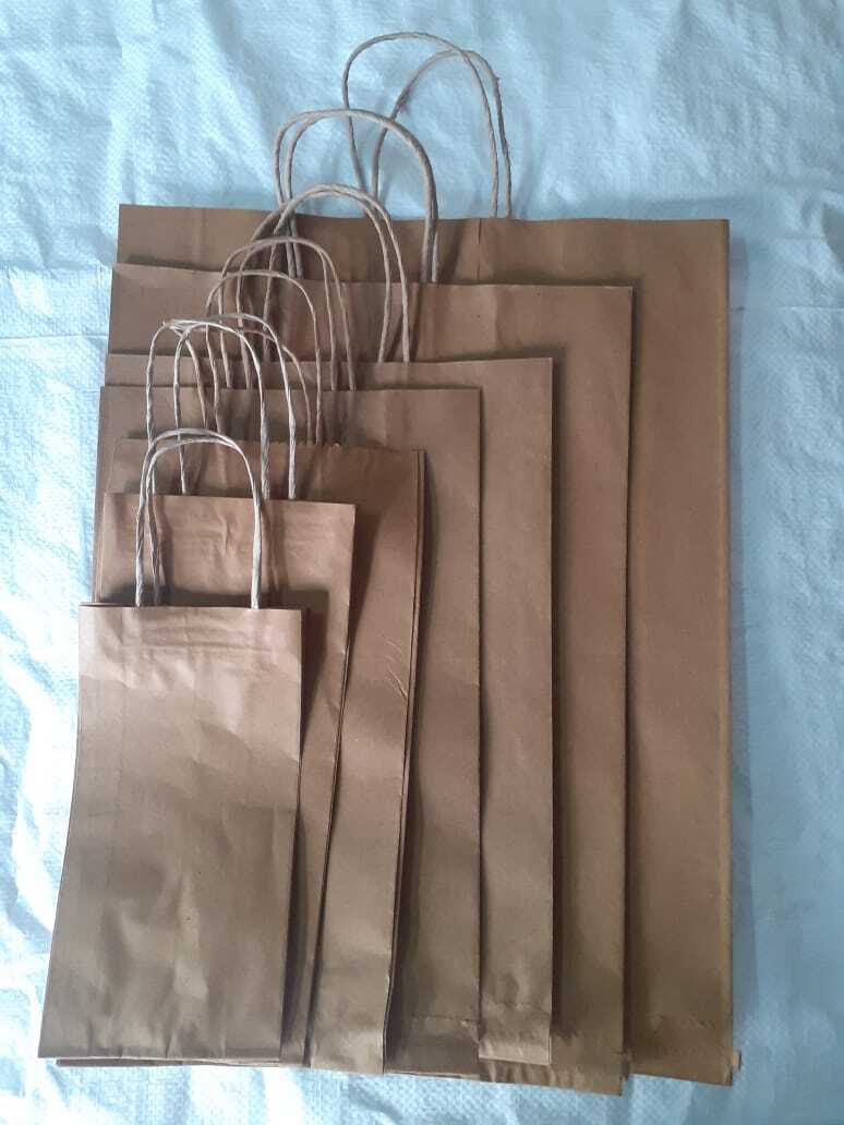 Brown Paper Bag - Kraft Paper, Customized Sizes, Brown Color | Patch Handles, Max Load 2-3 Kg, Custom Designs And Logos, Screen Printing Available