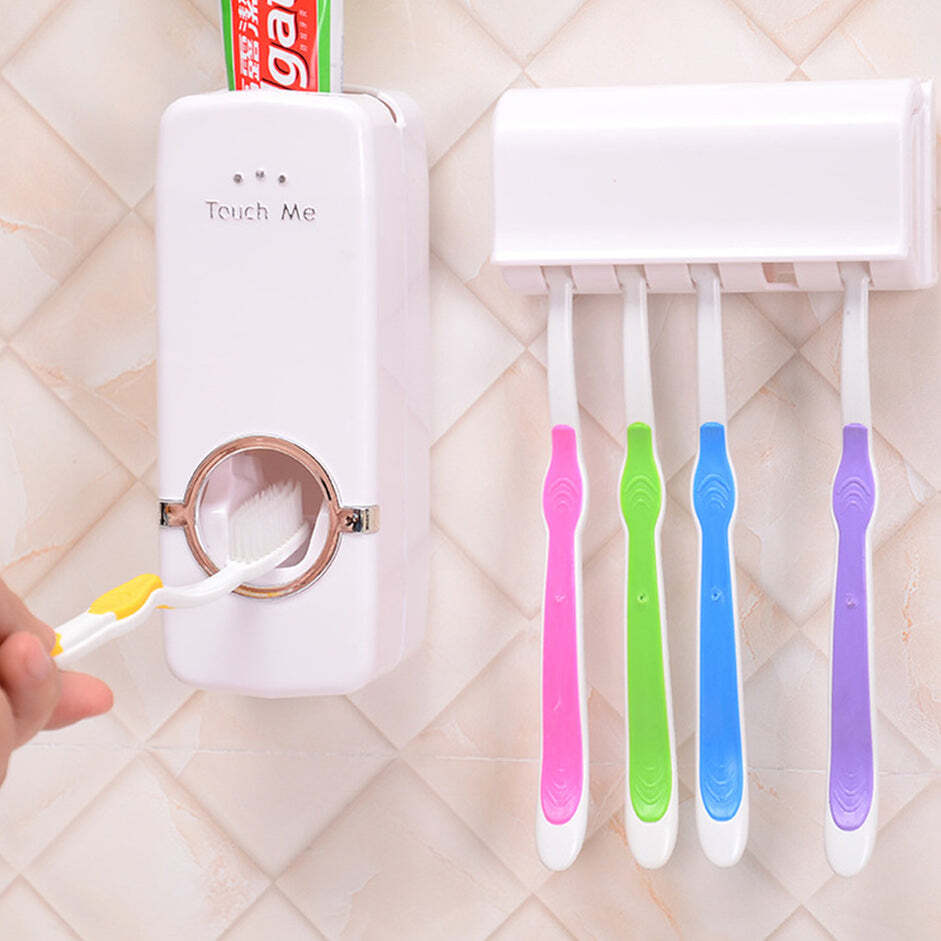 White Hands Free Wall Mounted Plastic Dust Proof Automatic Toothpaste Dispenser (0174a)