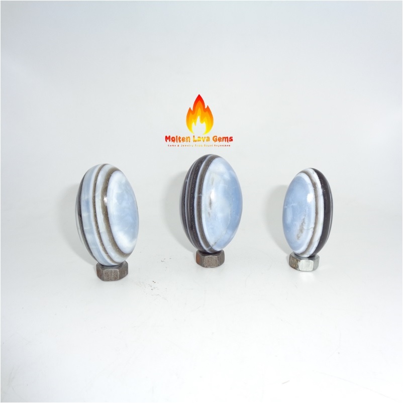 Owhyee Blue Opal Shiv Lingam - 30 To 35 Mm Oval Shaped Crystals, Natural Blue With Black Lines For Healing And Home Decoration