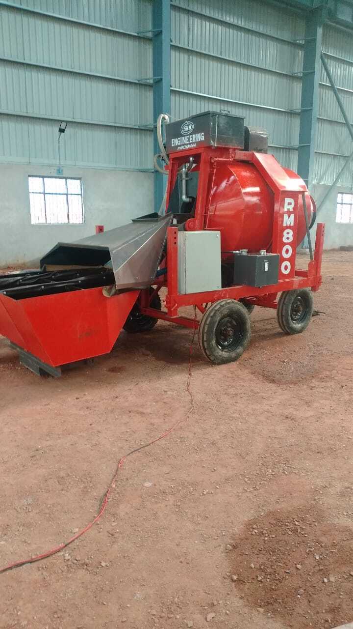 Reversible Concrete Mixer - 800kg Capacity, 12x6.5x11 Ft Dimensions, Customized Color, 10 Hp Motor, Plc Control, Hydraulic Oil Cooling, 10 Cum/hr Output, Pneumatic Wheels, 1.2 Meter Discharge Height