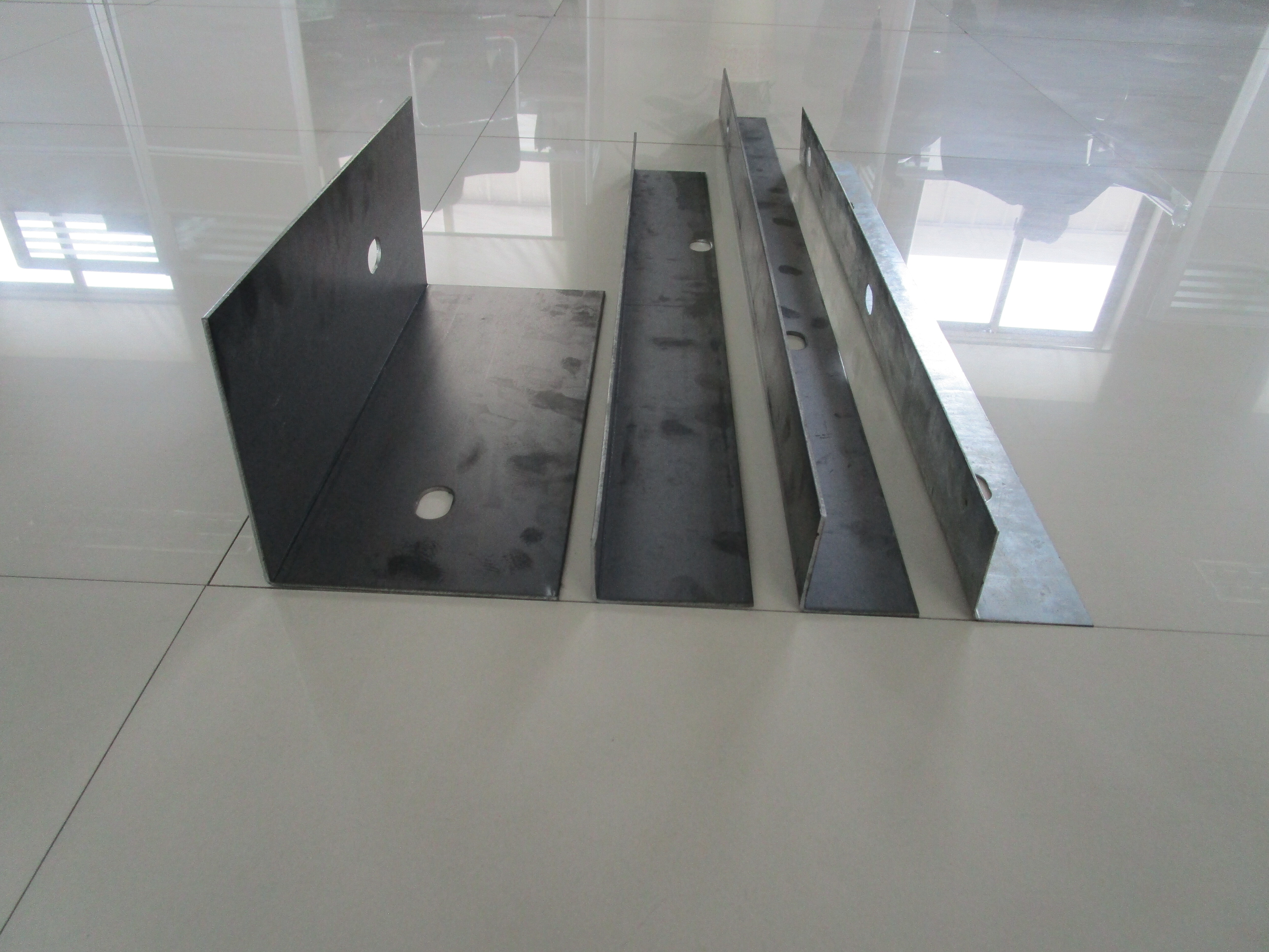 L Angle Forming Machine - Gi Steel Coil, 12x1.8x1.8m, Blue - Automatic Plc Control, Hydraulic Cutting System, 18m/min Speed, 5.5x2kw Motor Power, 15660kg Weight, 3 Year Warranty