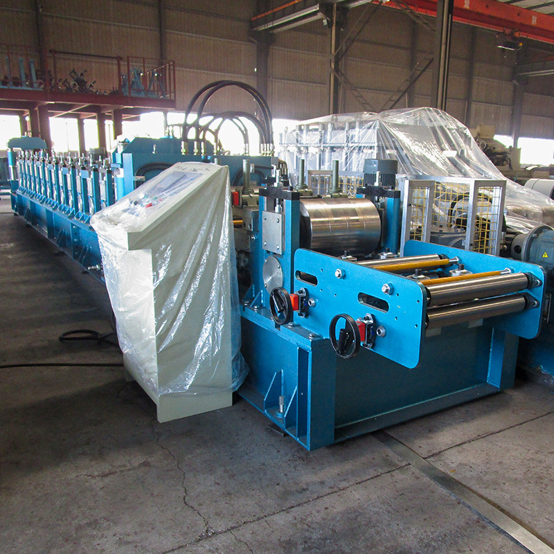 L Angle Forming Machine - Gi Steel Coil, 12x1.8x1.8m, Blue - Automatic Plc Control, Hydraulic Cutting System, 18m/min Speed, 5.5x2kw Motor Power, 15660kg Weight, 3 Year Warranty