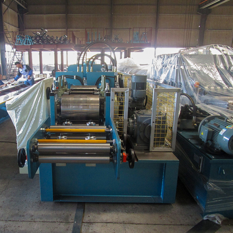 L Angle Forming Machine - Gi Steel Coil, 12x1.8x1.8m, Blue - Automatic Plc Control, Hydraulic Cutting System, 18m/min Speed, 5.5x2kw Motor Power, 15660kg Weight, 3 Year Warranty