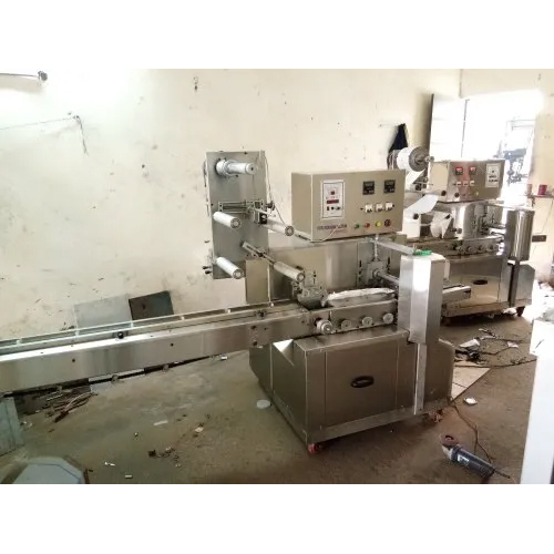 स्वचालित हॉरिजॉन्टल फ्लो रैप पैकेजिंग मशीन