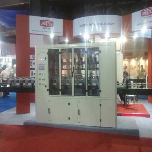 Edible Oil Filling Machine - Mild Steel, White Color | High Performance, High Efficiency, Electric Drive, Automatic Grade