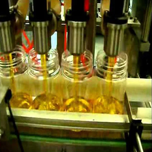 Cooking Oil Filling Machine - Mild Steel Build, 1000 Bottles Per Hour Capacity | Automatic, Electric Drive, High Efficiency, Sleek Silver Design
