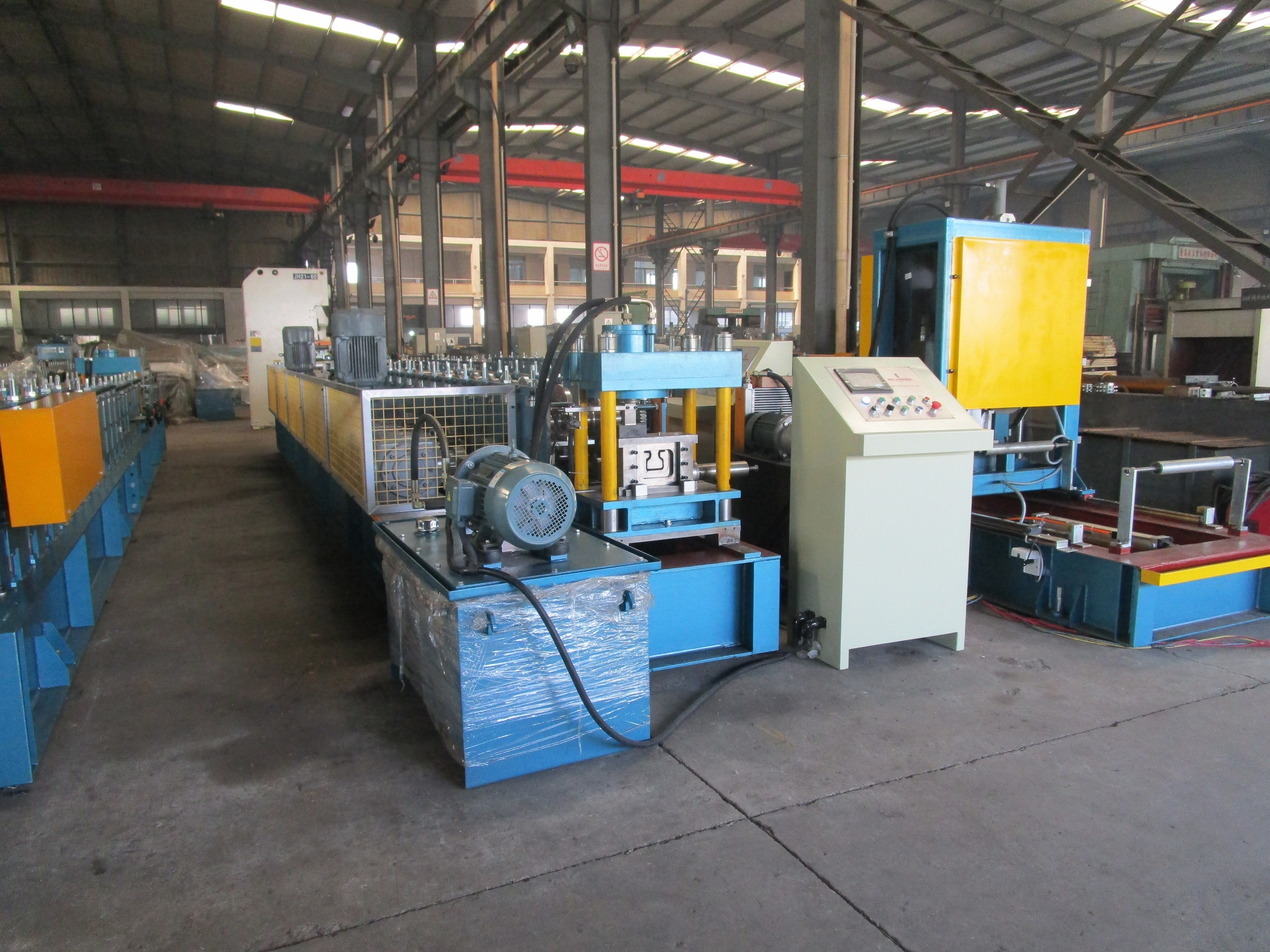 Storage Shelf Roll Forming Machine - Gi/black Steel Coils, 12m X 1.7m X 2.65m, Blue - 18m/min Speed, Automatic Plc Control, 3-year Guarantee