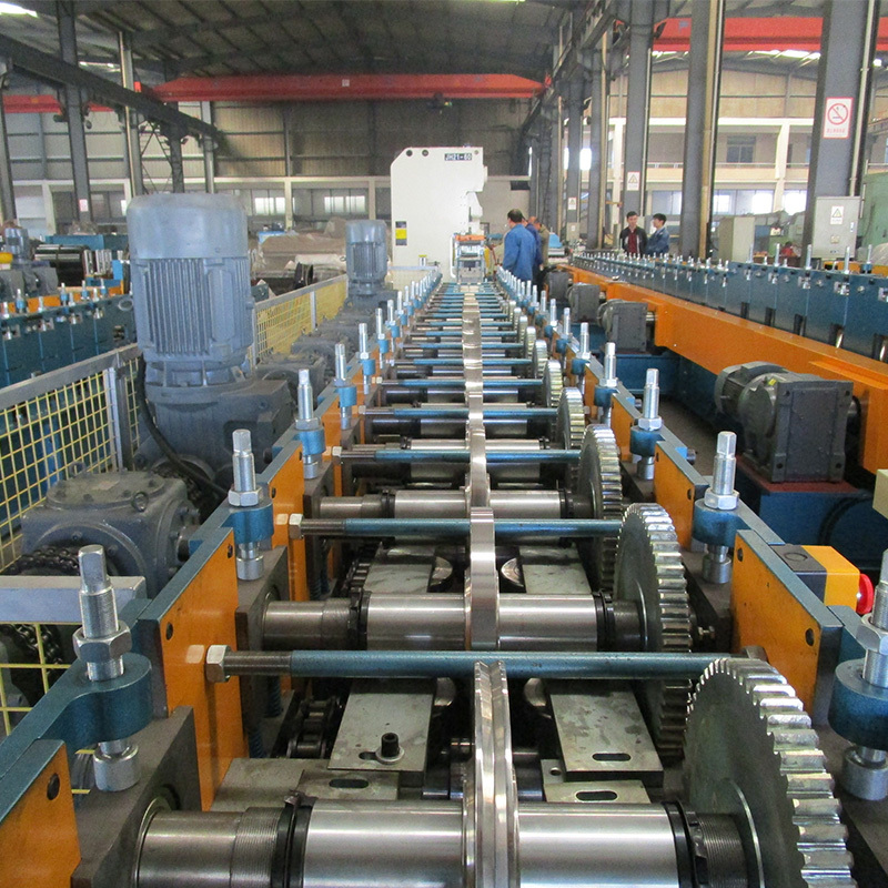 Storage Shelf Roll Forming Machine - Gi/black Steel Coils, 12m X 1.7m X 2.65m, Blue - 18m/min Speed, Automatic Plc Control, 3-year Guarantee