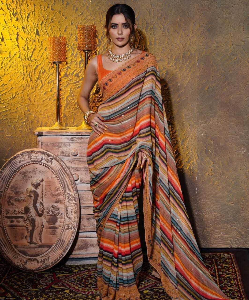 Beautiful Heavy Sequence Print Party Wear Georgette Saree - 5.5 Meters, Orange Color | Comfortable Fit, Elegant Design, Stylish Look, Unique Style, Vibrant Colors, Embroidered Border
