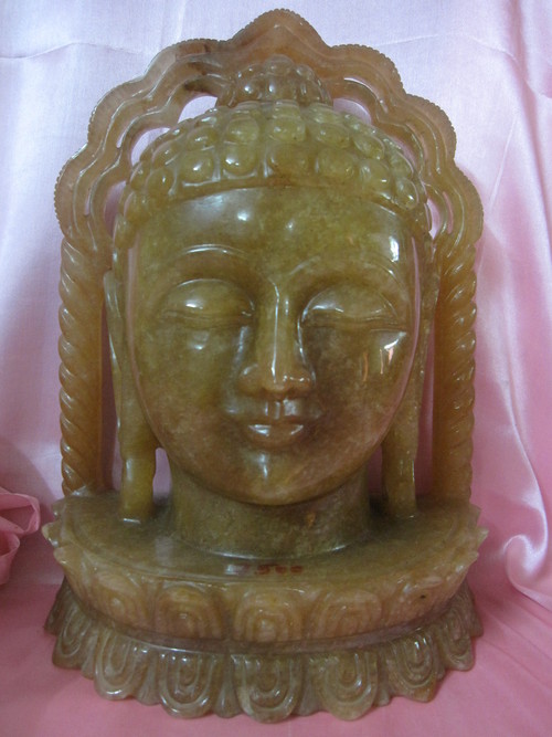 पीला एवेन्ज्यूरिन बुद्ध सिर