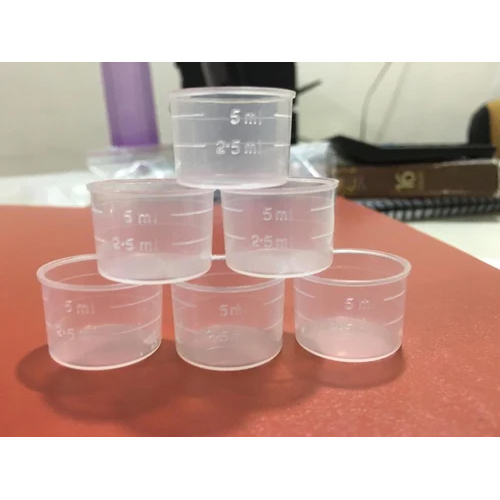 पारदर्शी प्लास्टिक मापने की टोपी