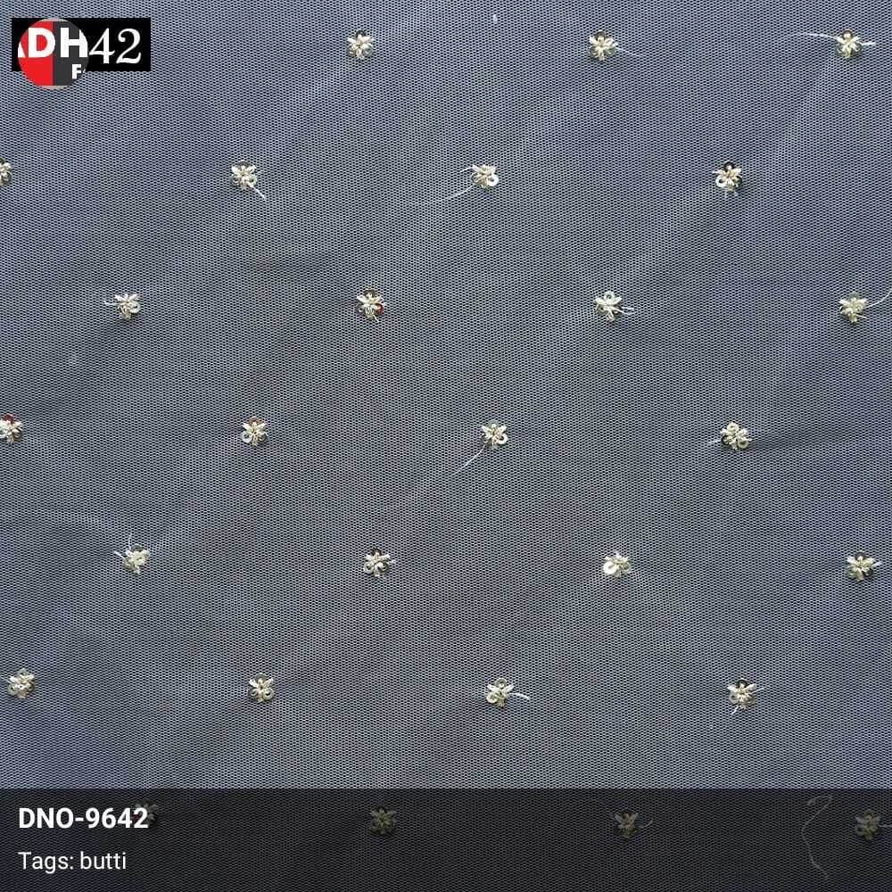 Blend Fabrics Glamorous Sequins Embroidered Butti On Net Fabric: The Perfect Way To Stand Out From The Crowd Madhav Fashion