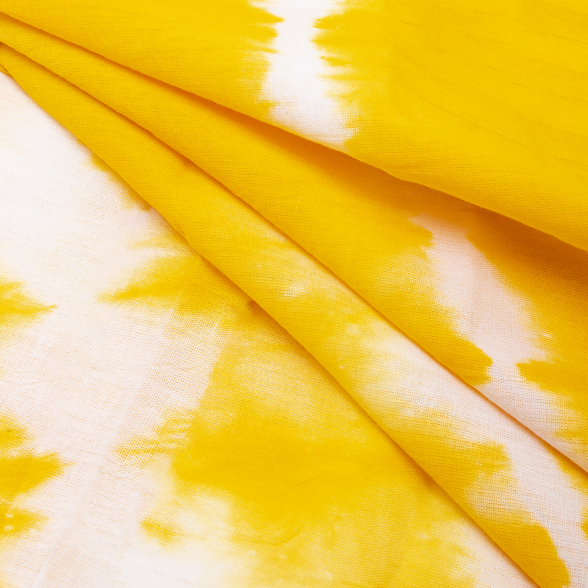 Tie And Dye Cotton Fabric In White And Dark Yellow