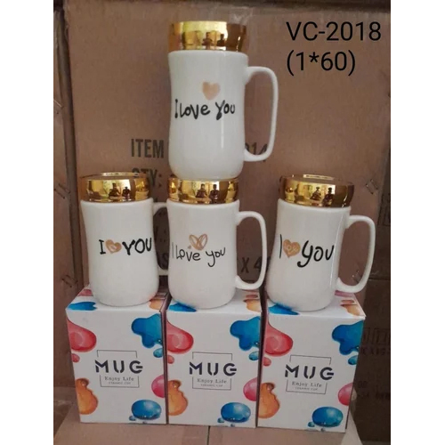 सफ़ेद और गोल्डन सिरेमिक कॉफ़ी और मिल्क मग