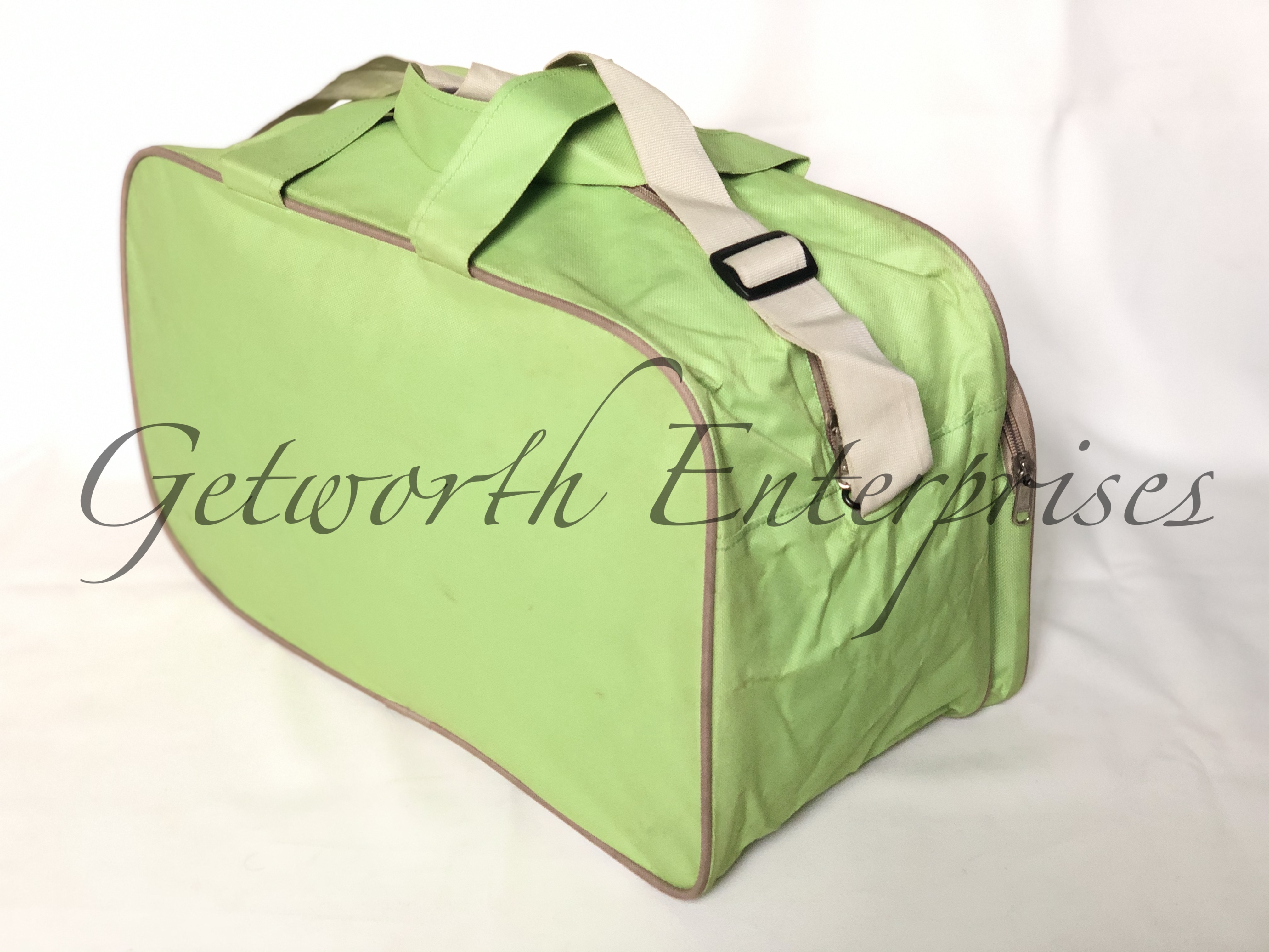 Multi Color Complimentary Travel Bag - Material: Premium Rexine, Size: 19" X 11" X 10", Color: Multi Color, Features: Lightweight, Durable, Attractive Design, Ideal For Gifting