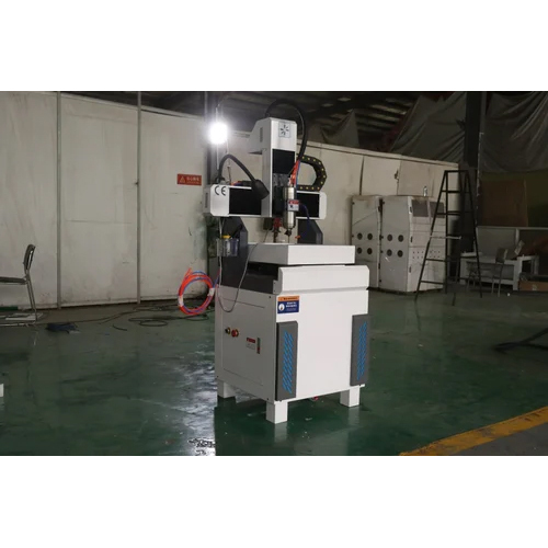 Cnc Die Making Machine - Stainless Steel, 300 X 300 / 400 X 400mm Table Size, 220v Electric Power Source | Automatic Industrial Equipment, Non-computerized, Weighing 600kg