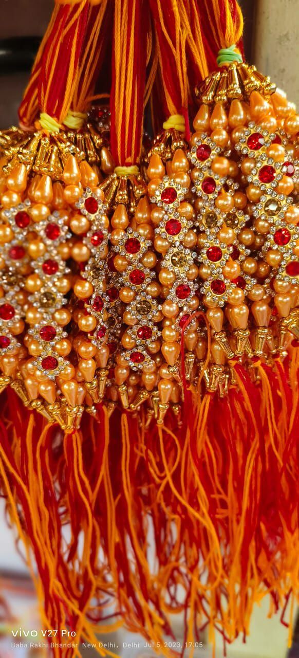 Fancy Stone Rakhi - Stone & Polyester | 10-12 Cm, Red Color, Elegant Design With Gold Accents, Auspicious Occasion For Sibling Bonding