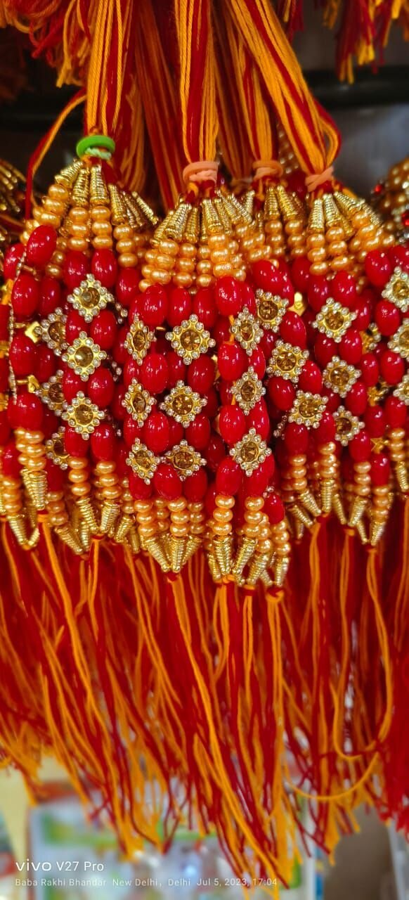 Fancy Stone Rakhi - Stone & Polyester | 10-12 Cm, Red Color, Elegant Design With Gold Accents, Auspicious Occasion For Sibling Bonding