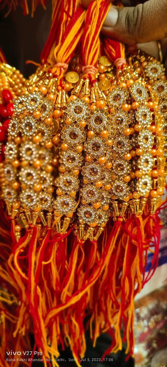 Fancy Stone Rakhi - Stone & Polyester | 10-12 Cm, Red Color, Elegant Design With Gold Accents, Auspicious Occasion For Sibling Bonding