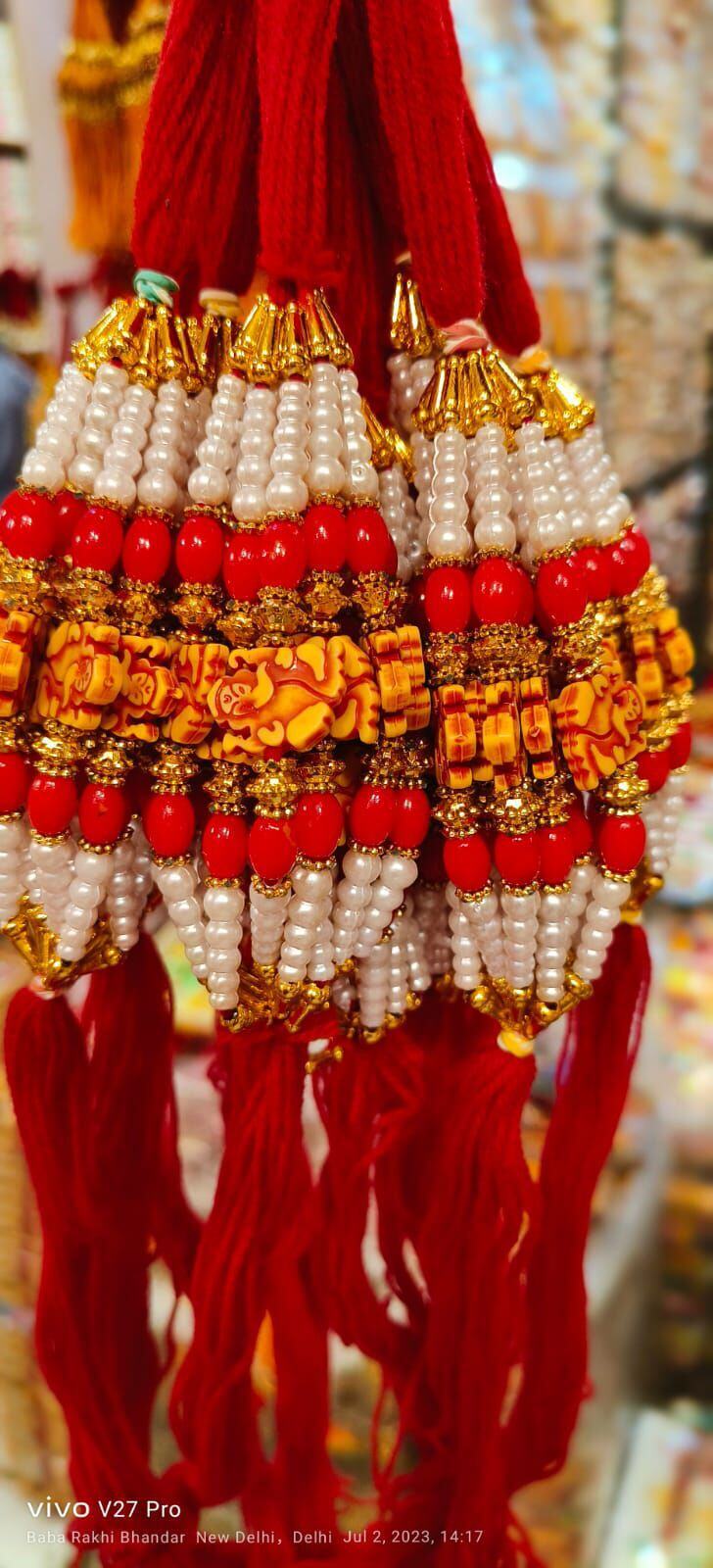 Fancy Rakhi New Modal - Beads And Thread, 20 Cm Length, Red Color , Auspicious Occasion, Elegant Design, Sibling Bonding With Traditional Motif