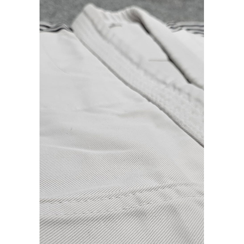 Different Available White Kung Fu Uniform