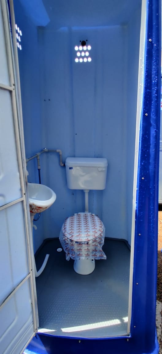 Blue Stack-a-let Portable Toilet Indian Style
