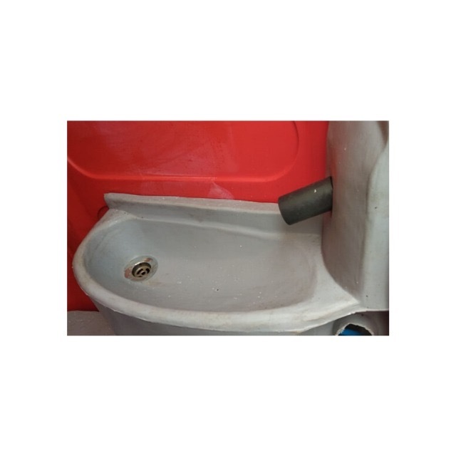 Red-grey-white Porta Clean Chemical Toilet