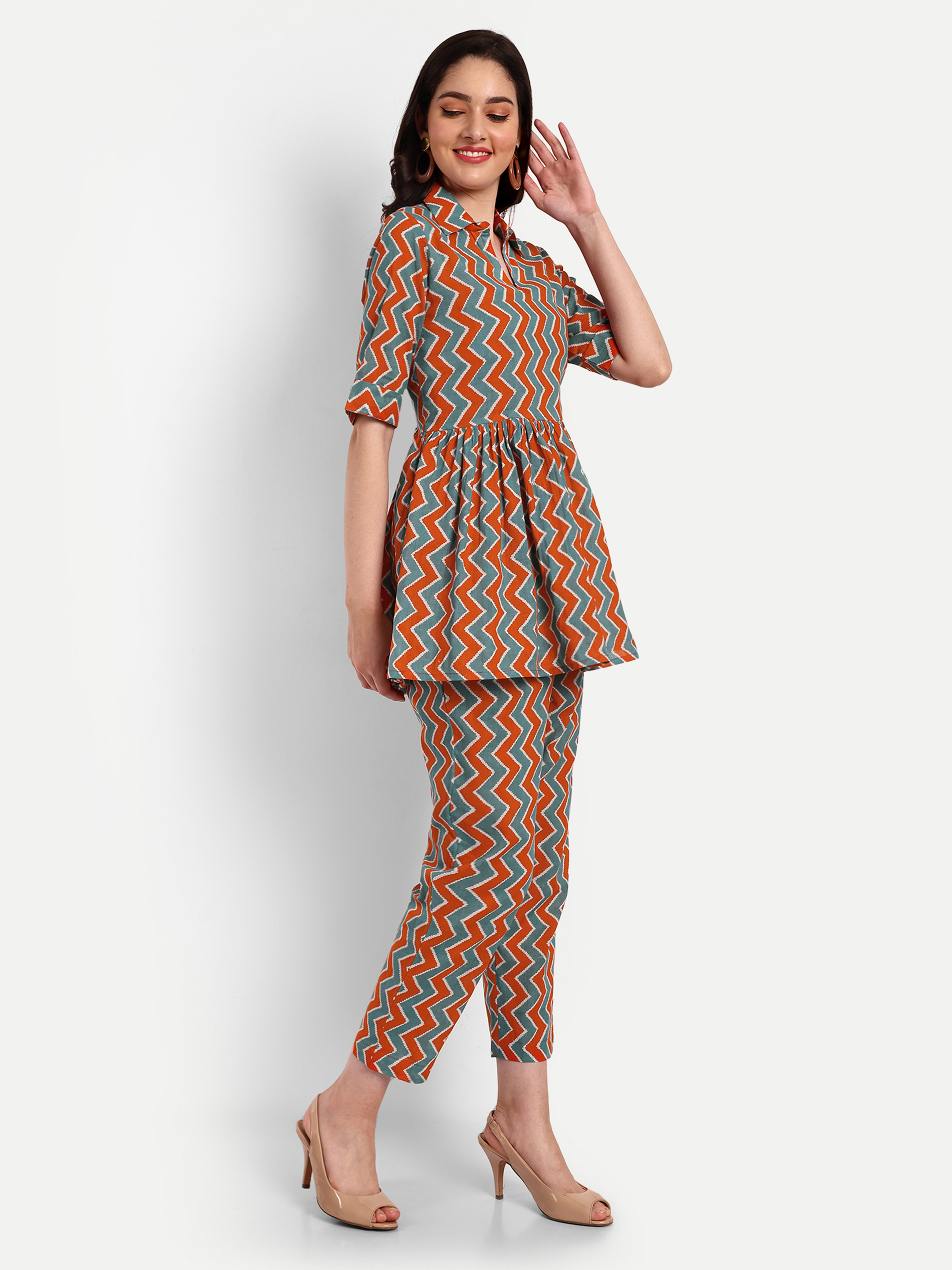Printed Orange And Green Peplum Coord Sets