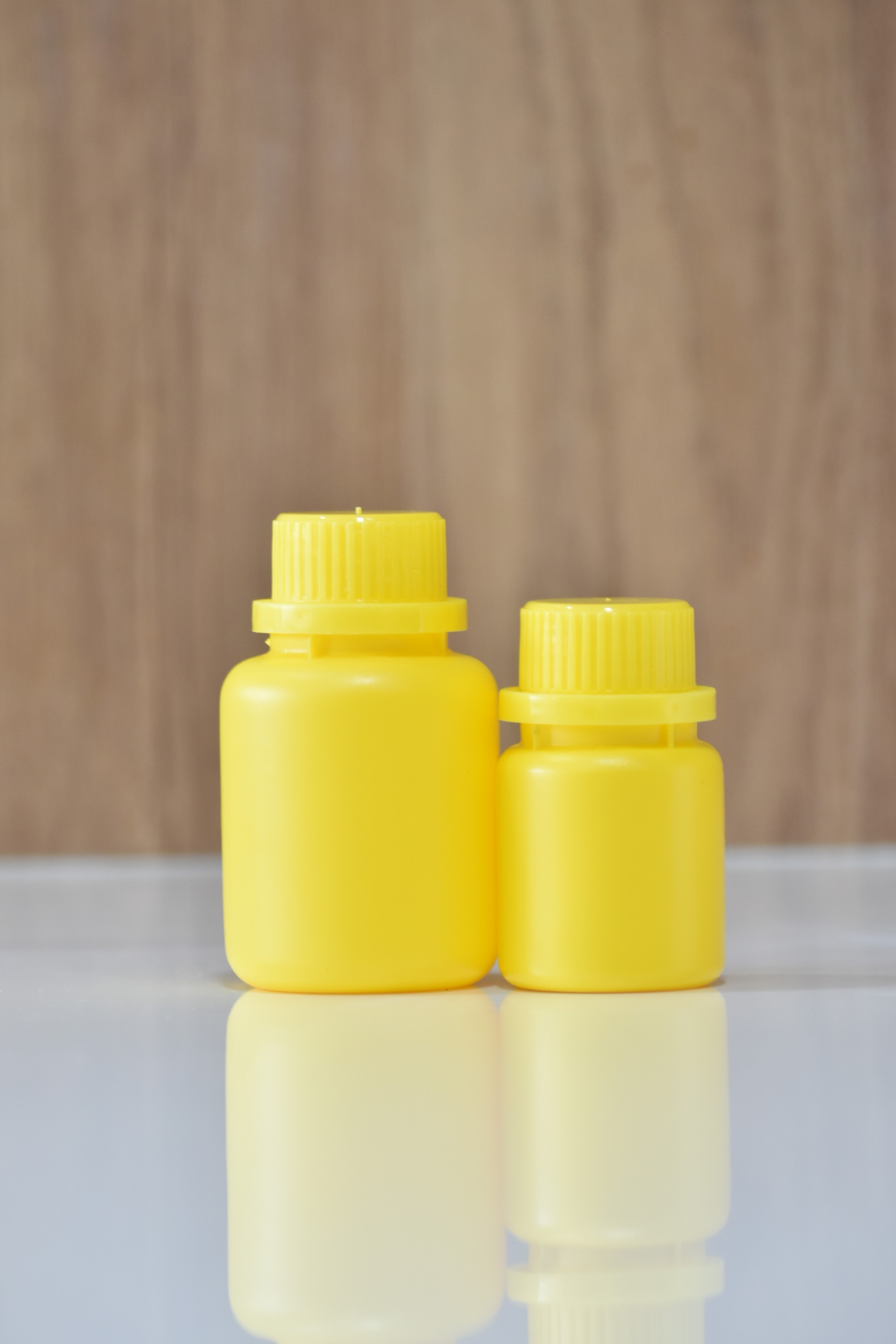 Ayurvedic Medicine Bottles - Food & Pharma Grade Hdpe Polymer, Round Shape 50ml & 100ml In Multiple Colors