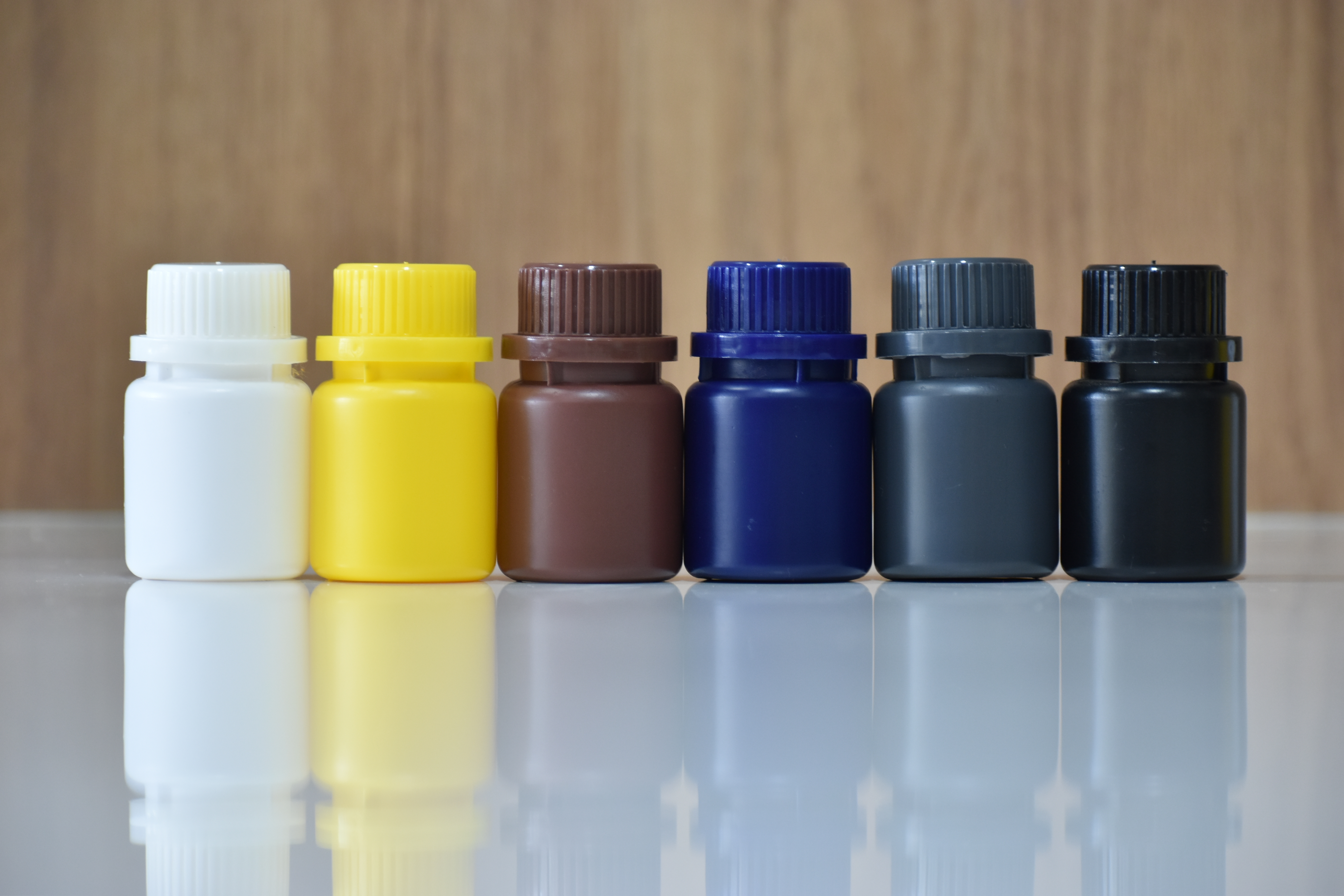 Ayurvedic Medicine Bottles - Food & Pharma Grade Hdpe Polymer, Round Shape 50ml & 100ml In Multiple Colors
