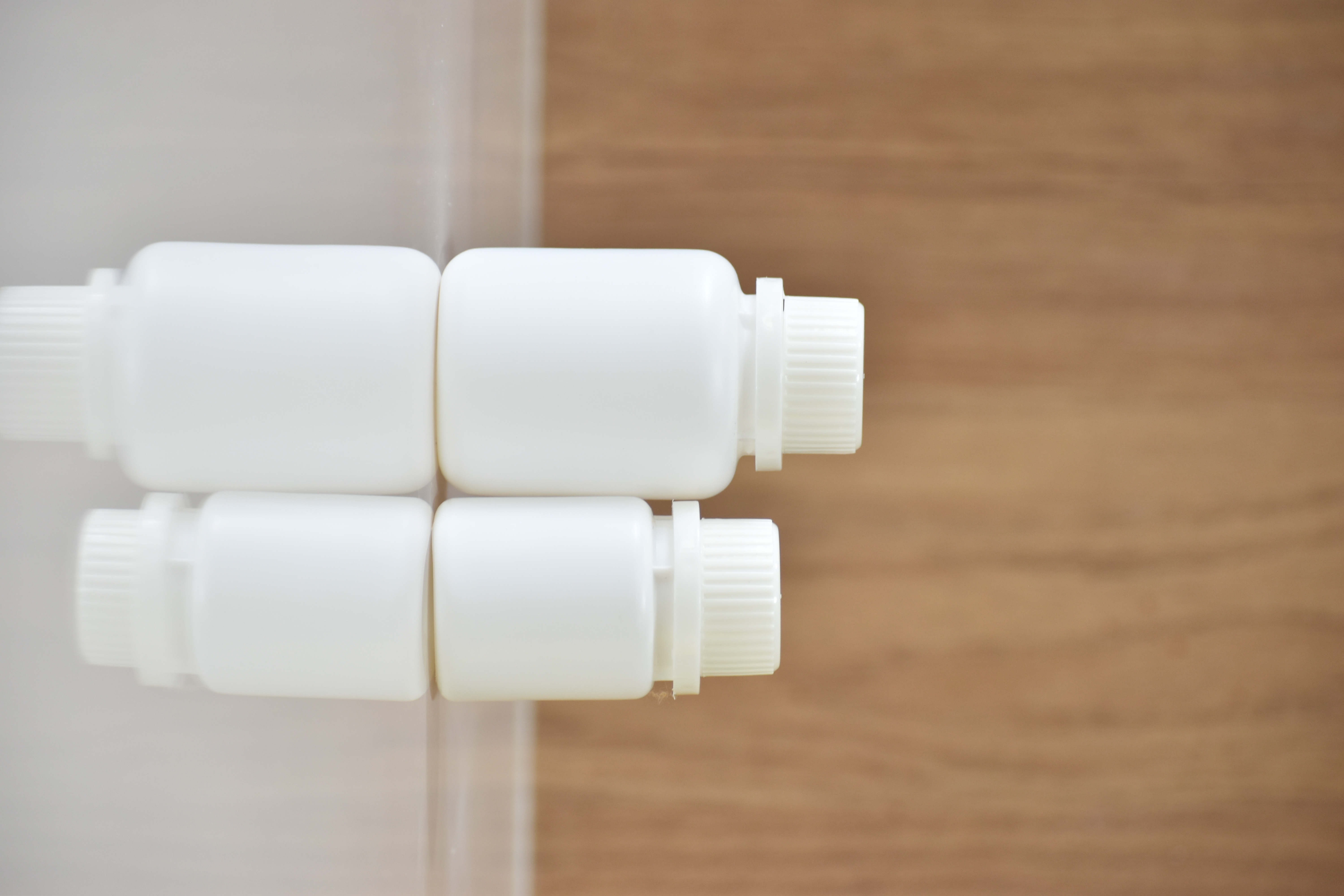 Ayurvedic Medicine Bottles - Food & Pharma Grade Hdpe Polymer, Round Shape 50ml & 100ml In Multiple Colors