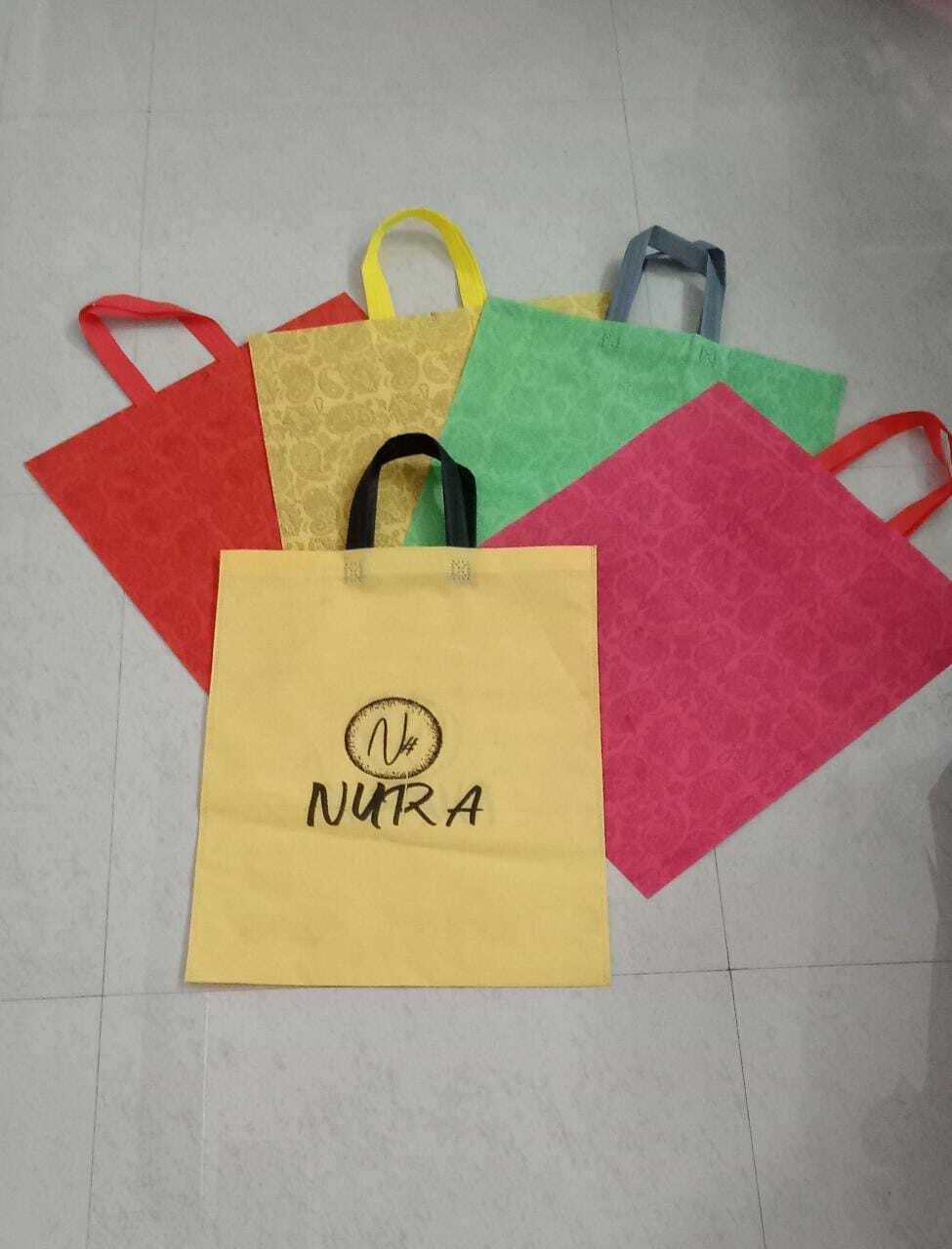 Non Woven Loop Handle Bag - Non Woven Fabric, With Sturdy Carry Handle Design For Easy Transport