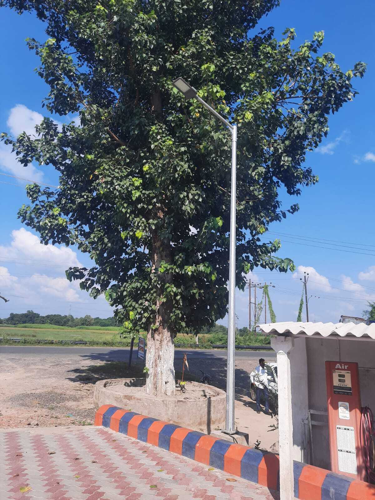 Octagonal Pole - Hot Dip Galvanized, 7 Mtr Height, 70mm Top Diameter, 130mm Bottom Diameter, 3mm Thickness, Base Plate 200x200x12mm, M-16 Foundation Bolt Set With Double Nuts And Washers | 40 Year Warranty, 45 Kg Weight