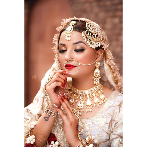 Bridal Lehnga and Jewellery - Trendy Ethnic White Lehnga with Golden Accents, No Fade Feature