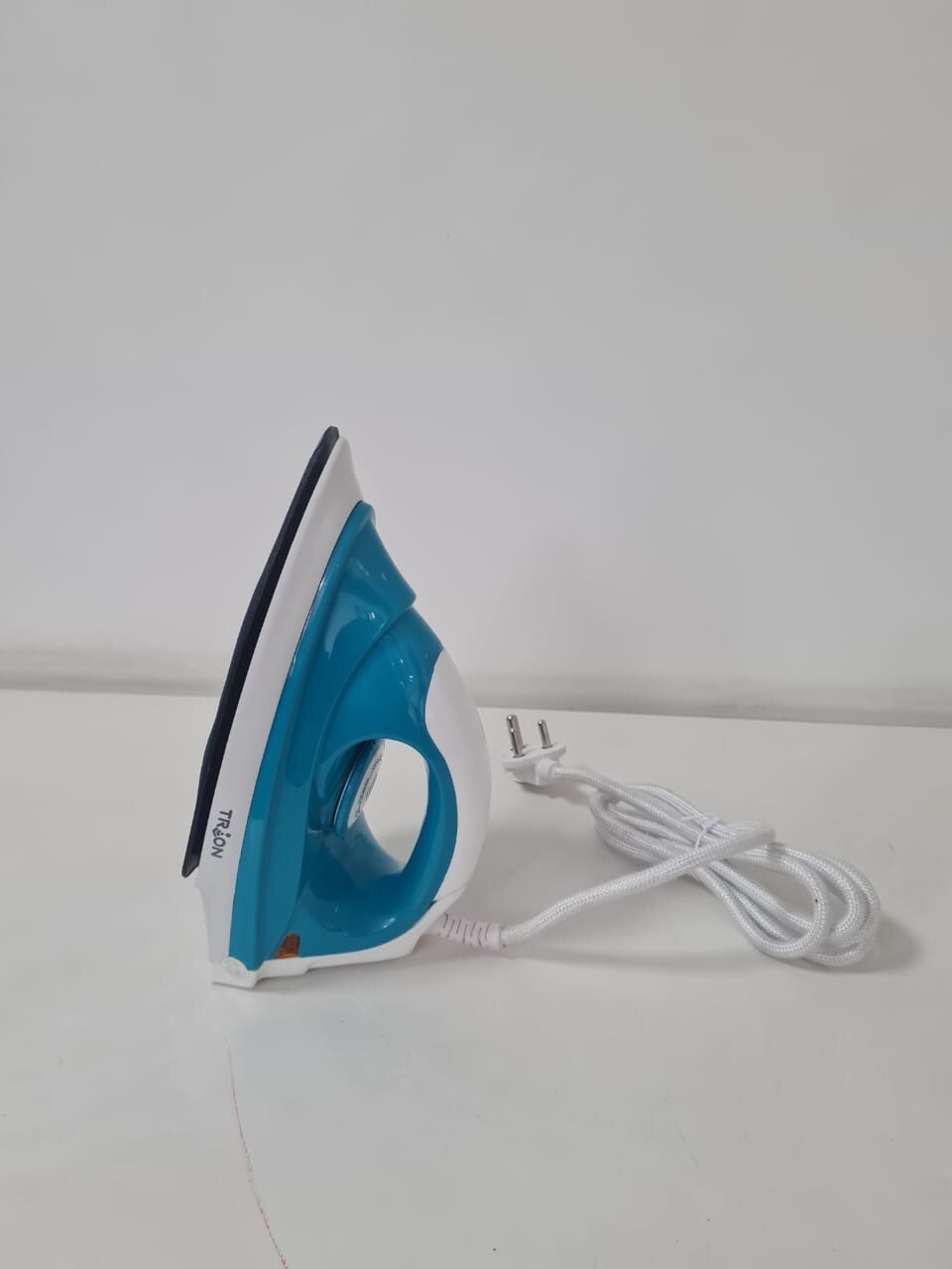 Trion Iron - Capacity: 10000 Pcs/min