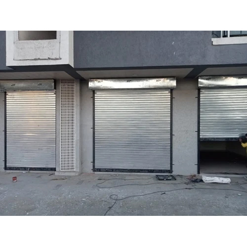 Galvanised Roller Shutter - Aluminum Material, Vertical Opening Pattern, Silver Color | Durable Design for Commercial and Industrial Use