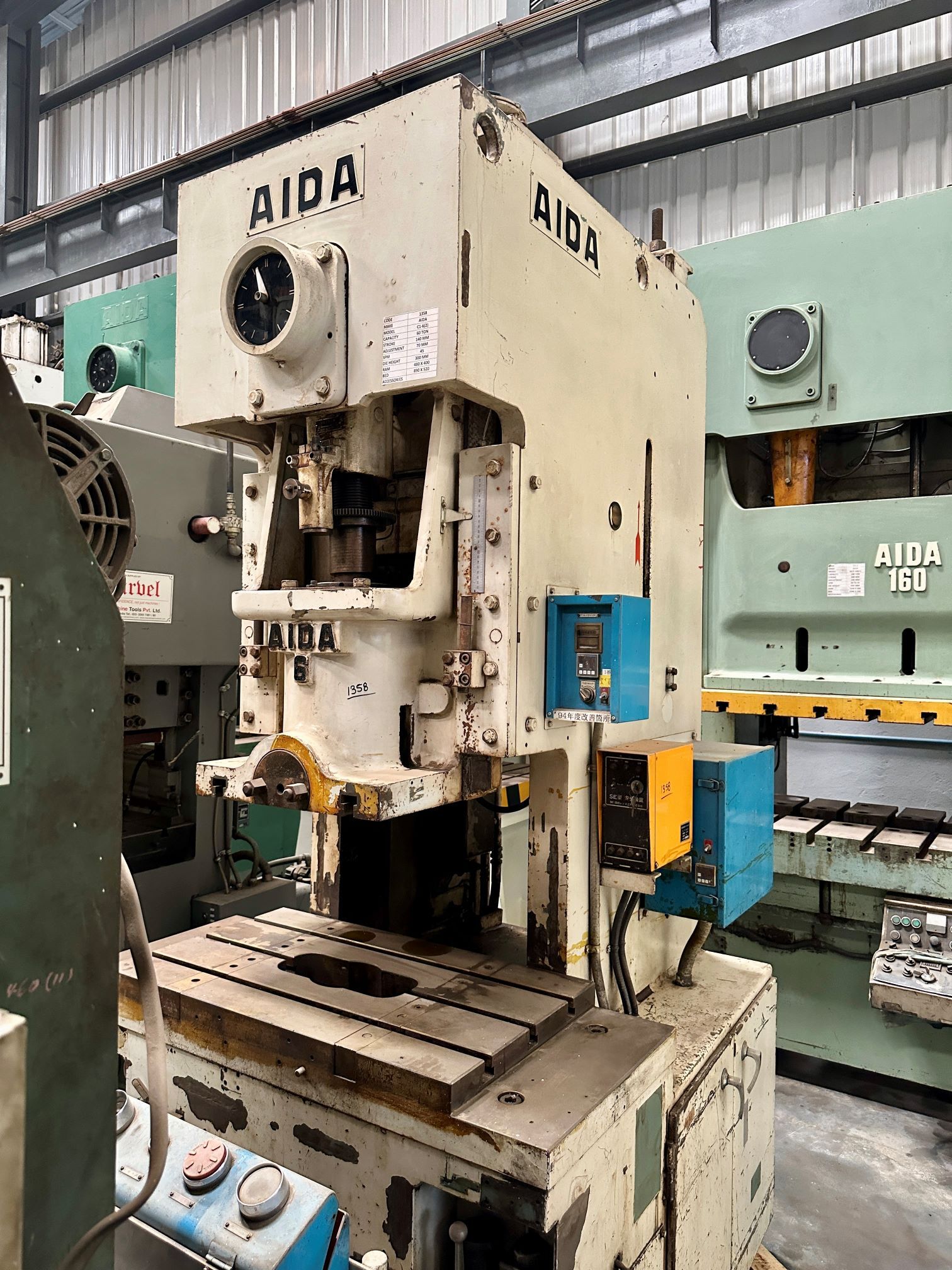 1358 Aida C Frame Single Crank Press - 60 Tons Capacity, Stroke: 140mm, Bed Size: 890x520mm, Ram Size: 480x400mm, Die Height: 300mm, Adjustment: 70mm, Spm: 45