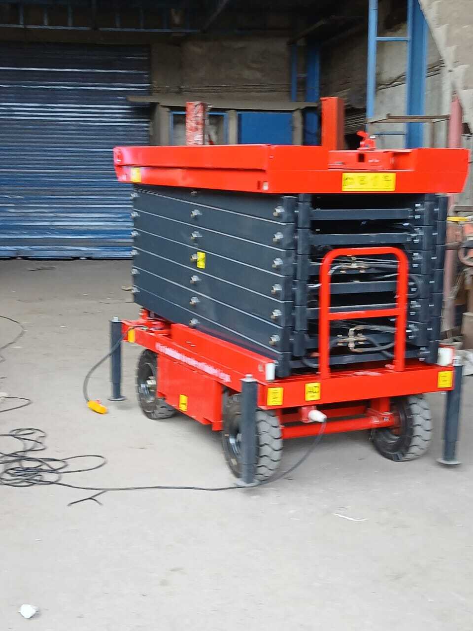 Hydraulic Movable Scissor Lift Table - 50 Feet Max Height 5 Ton Capacity New Condition Strong Structure Corrosion Resistant Easy Operation