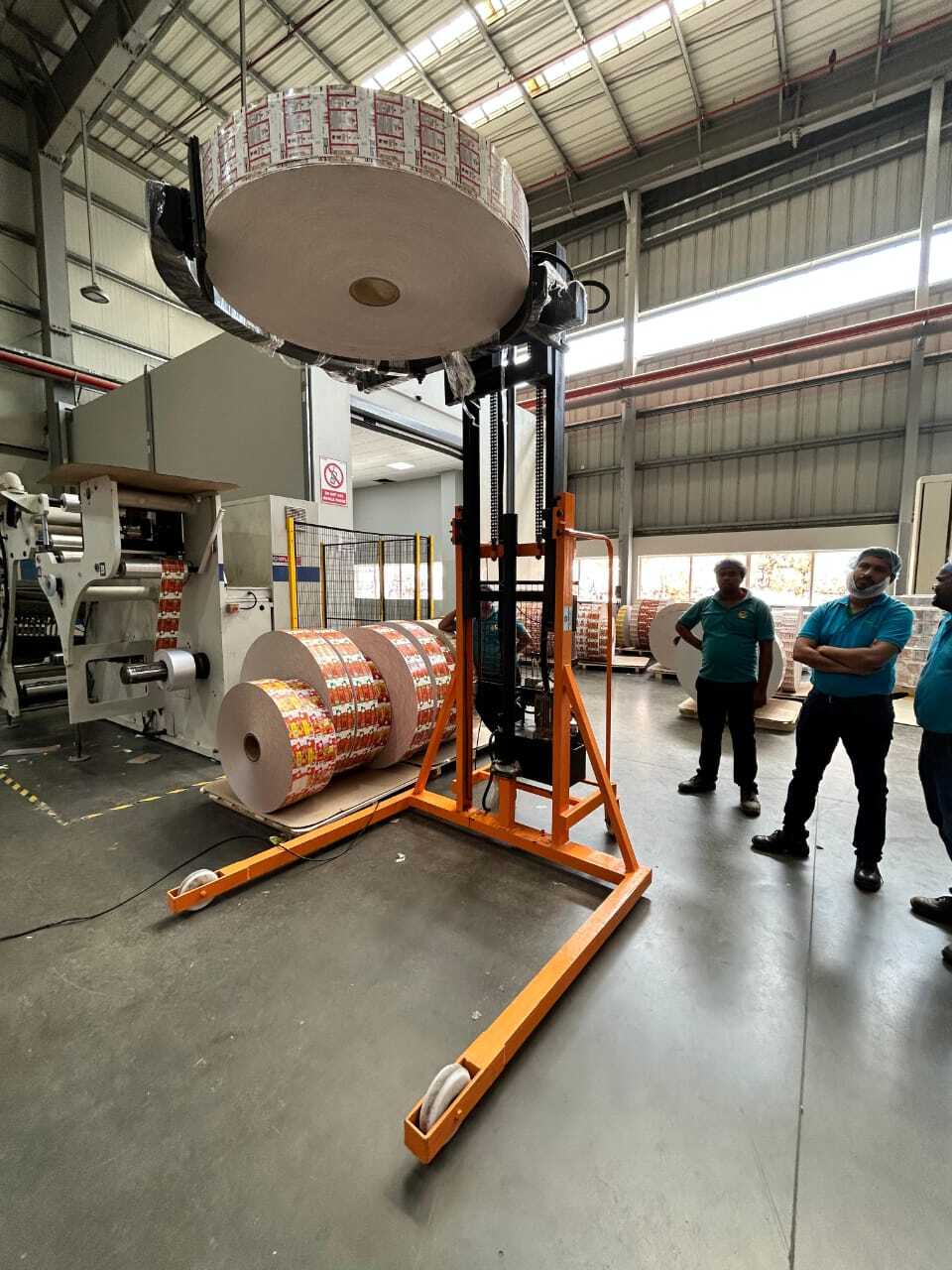 Consume Less Power Paper Roll Clamp Stacker