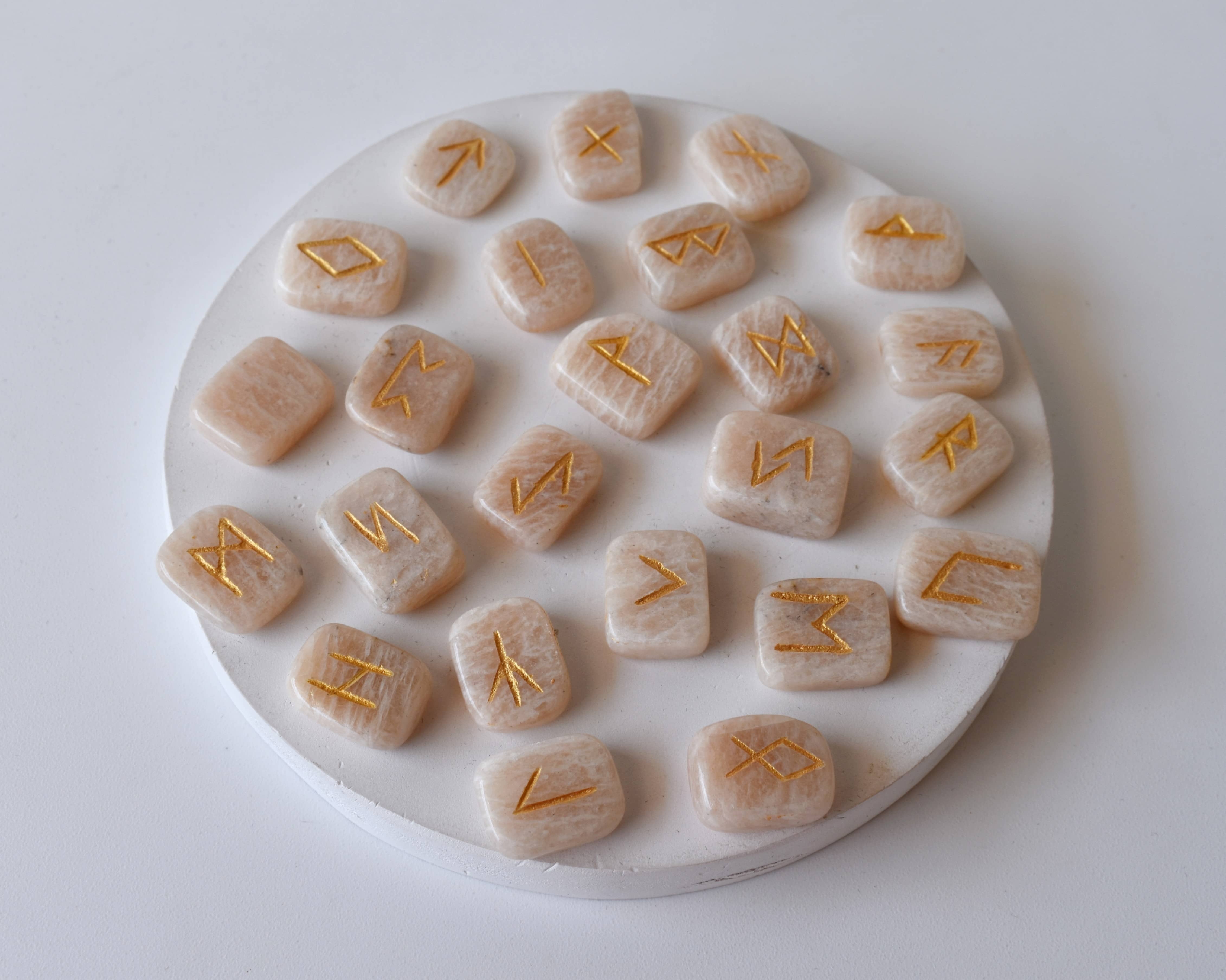 Moonstone Rune Set - Hand-carved Natural Moonstone Gemstones, 25 Unique Futhark Symbols, Includes Pouch & Guidebook, Optional Wooden Grid Plate