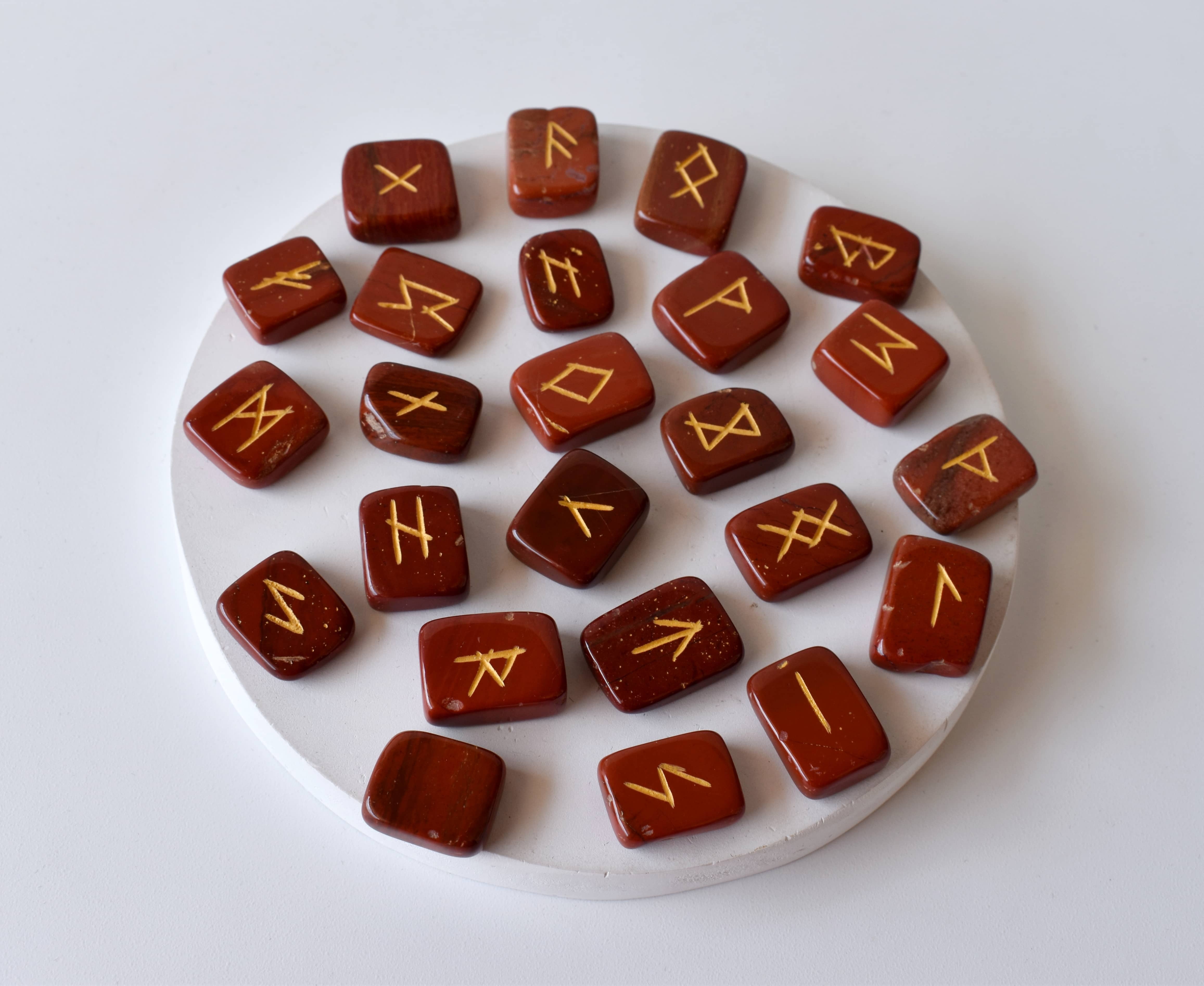 Red Jasper Rune Set - 25 Hand-carved Natural Gemstones, Unique Futhark Symbols, Includes Pouch, Info Cards & Optional 6" Wooden Grid Plate