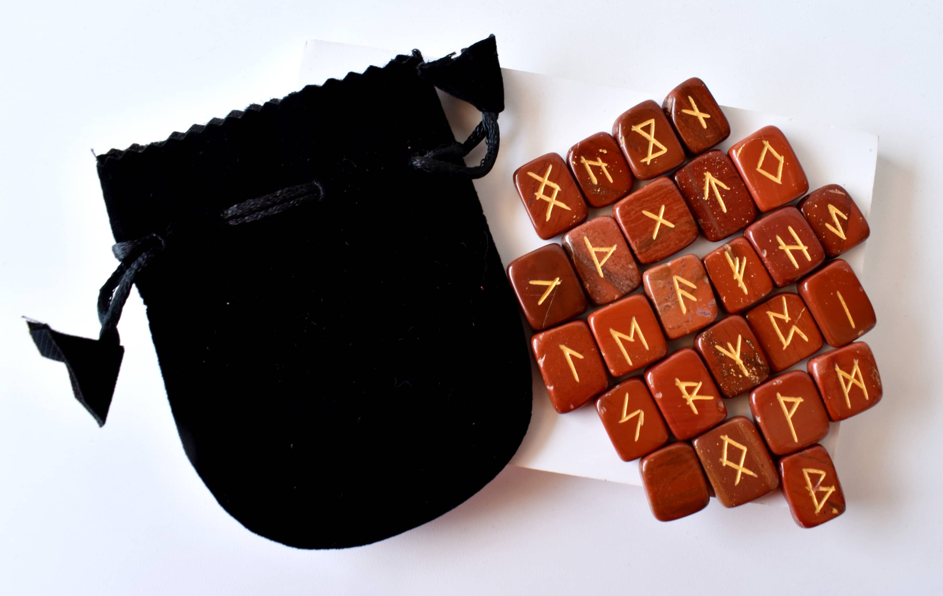 Red Jasper Rune Set - 25 Hand-carved Natural Gemstones, Unique Futhark Symbols, Includes Pouch, Info Cards & Optional 6" Wooden Grid Plate