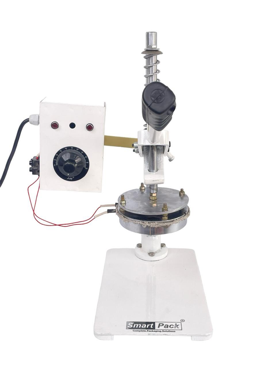 Foil Sealer Cap Closer Machine - Automatic Grade: Semi Automatic