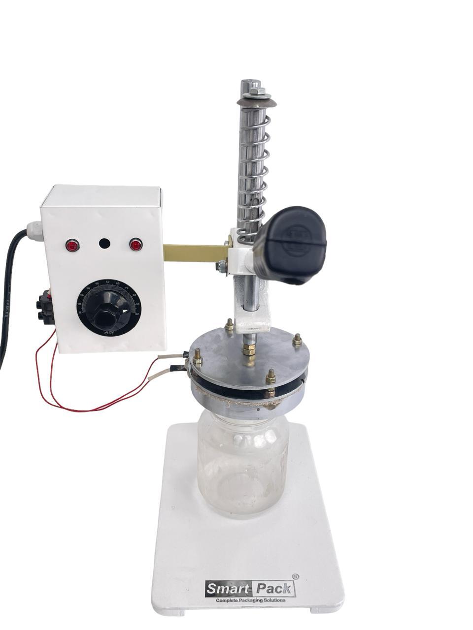 Foil Sealer Cap Closer Machine - Automatic Grade: Semi Automatic
